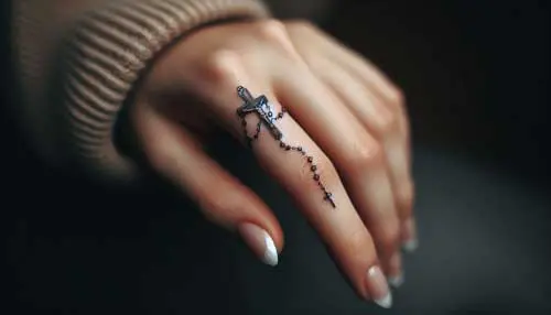 عکس تاتو صلیب روی انگشت عکس تاتو صلیب روی انگشت